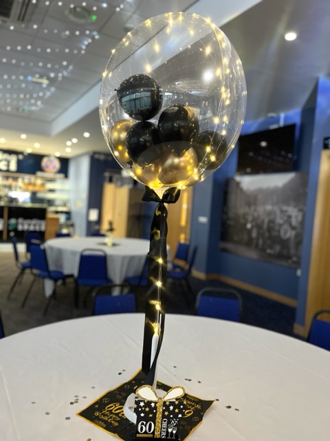 Balloon decoration on a table at a party in Shrewsbury